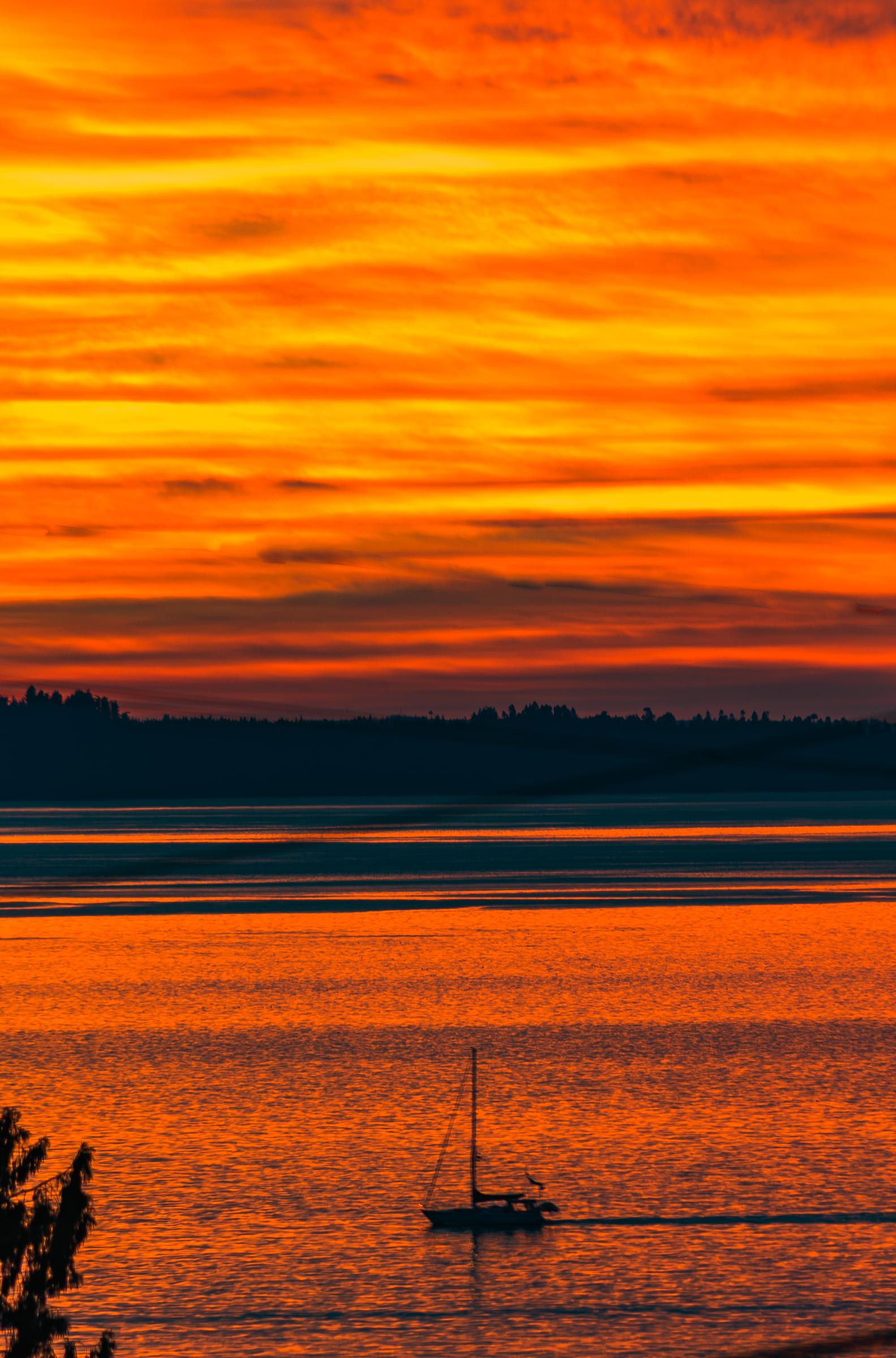 Sunset over the water Mount Rainier Washington State United States