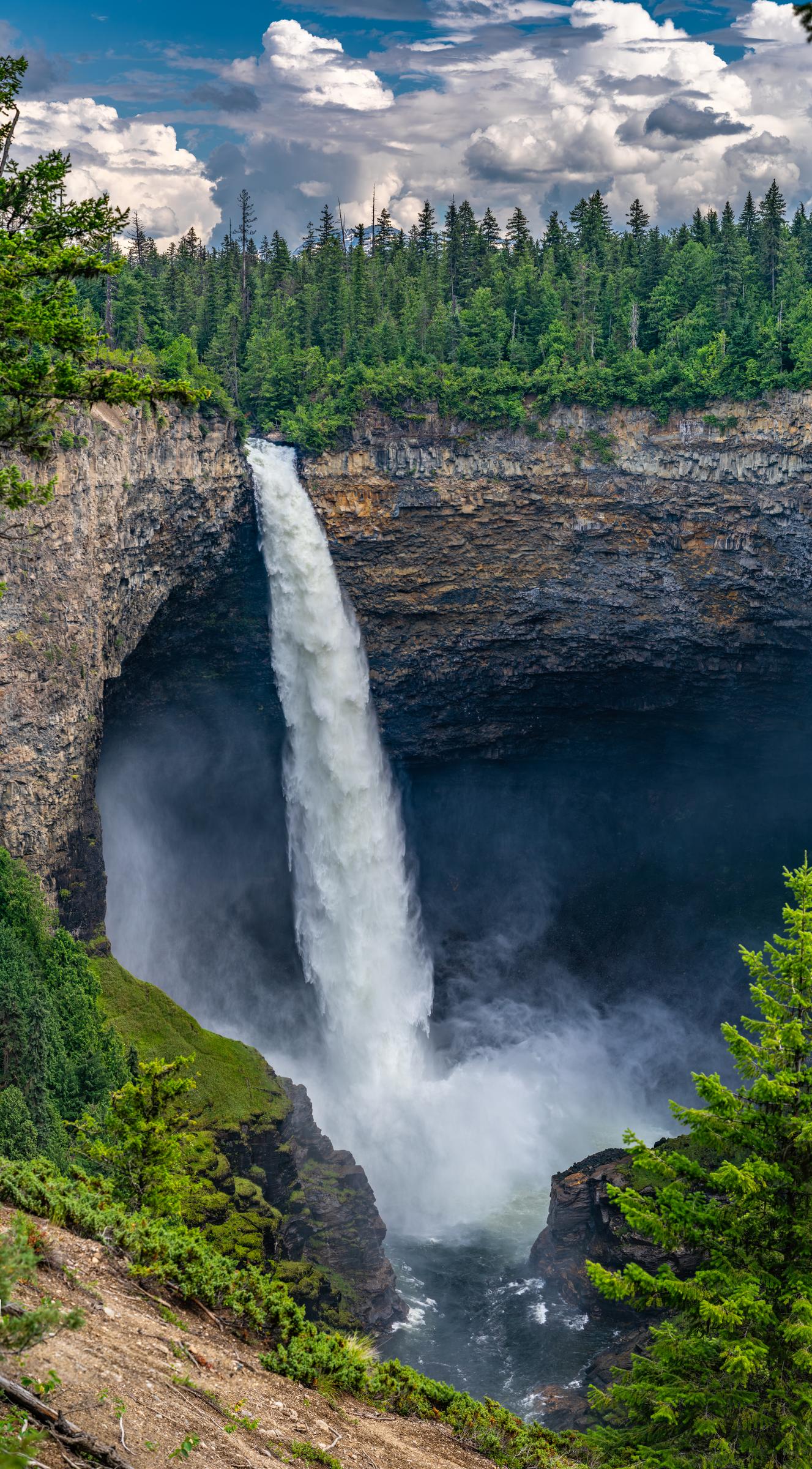 Massive waterfall plunging into a deep canyon Helmcken Falls British Columbia Canada