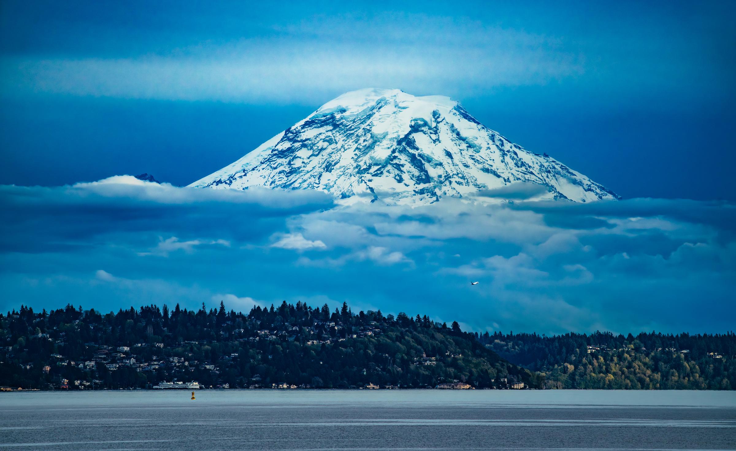 Mount Rainier viewed from across a body of water Seattle Washington United States