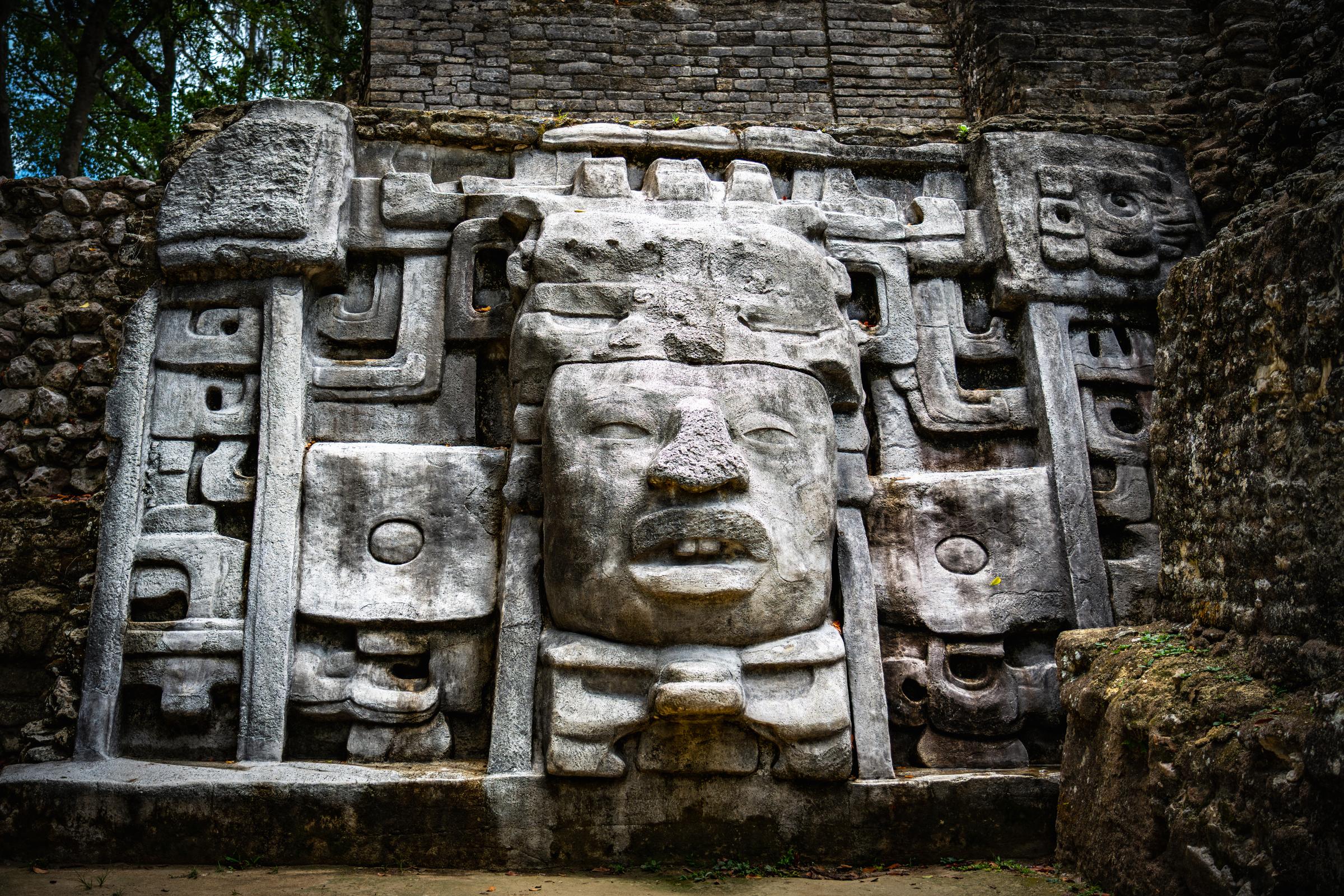 Mayan stone carving at a ruin Lamanai Mayan Ruins Belize Belize