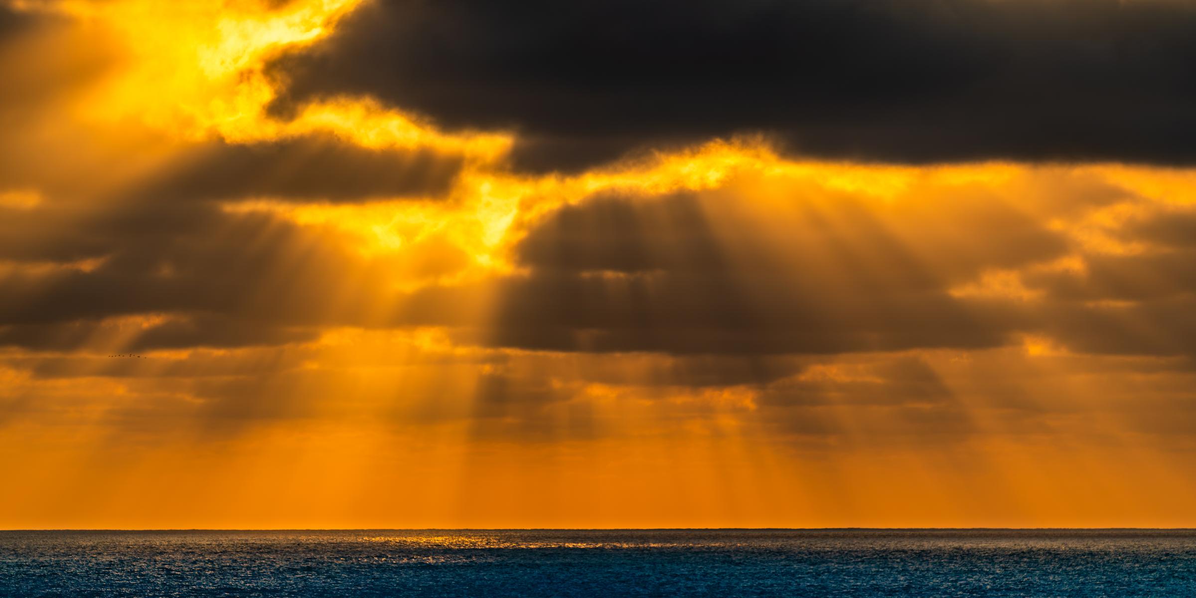 Sunlight Breaking Through Clouds Over Ocean Mazatlan Sinaloa Mexico