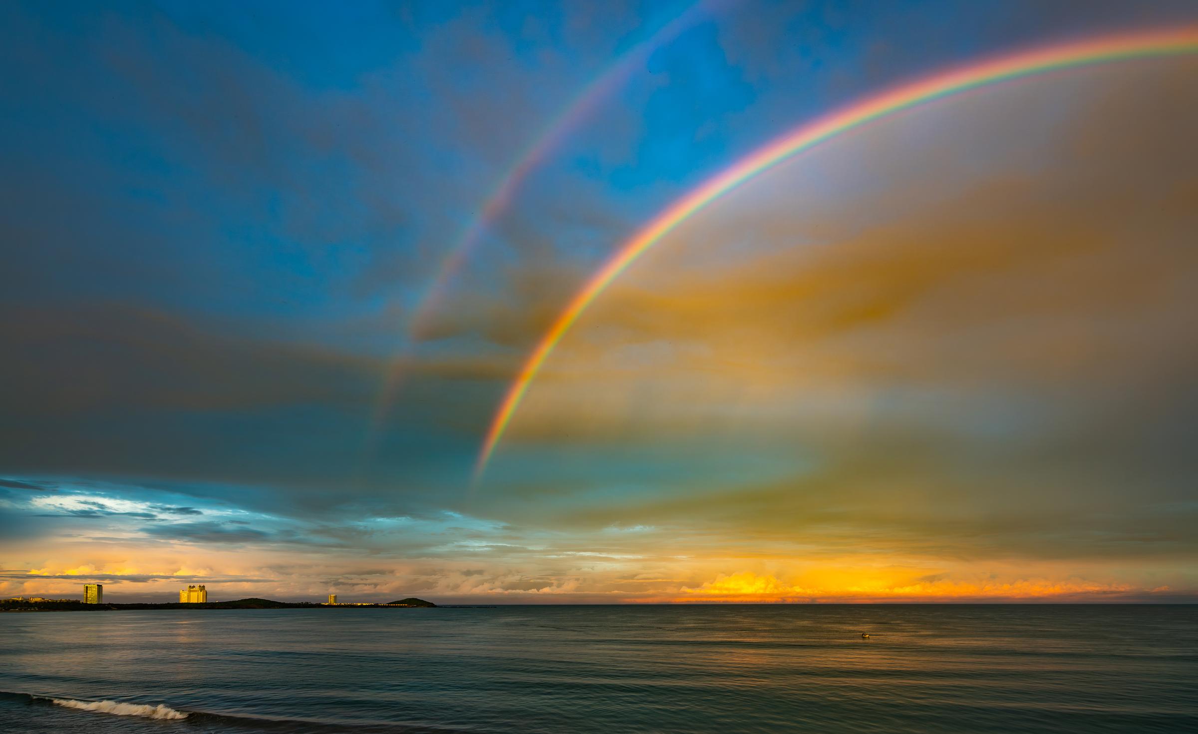 Rainbow over the ocean at dusk Mazatlan Sinaloa Mexico