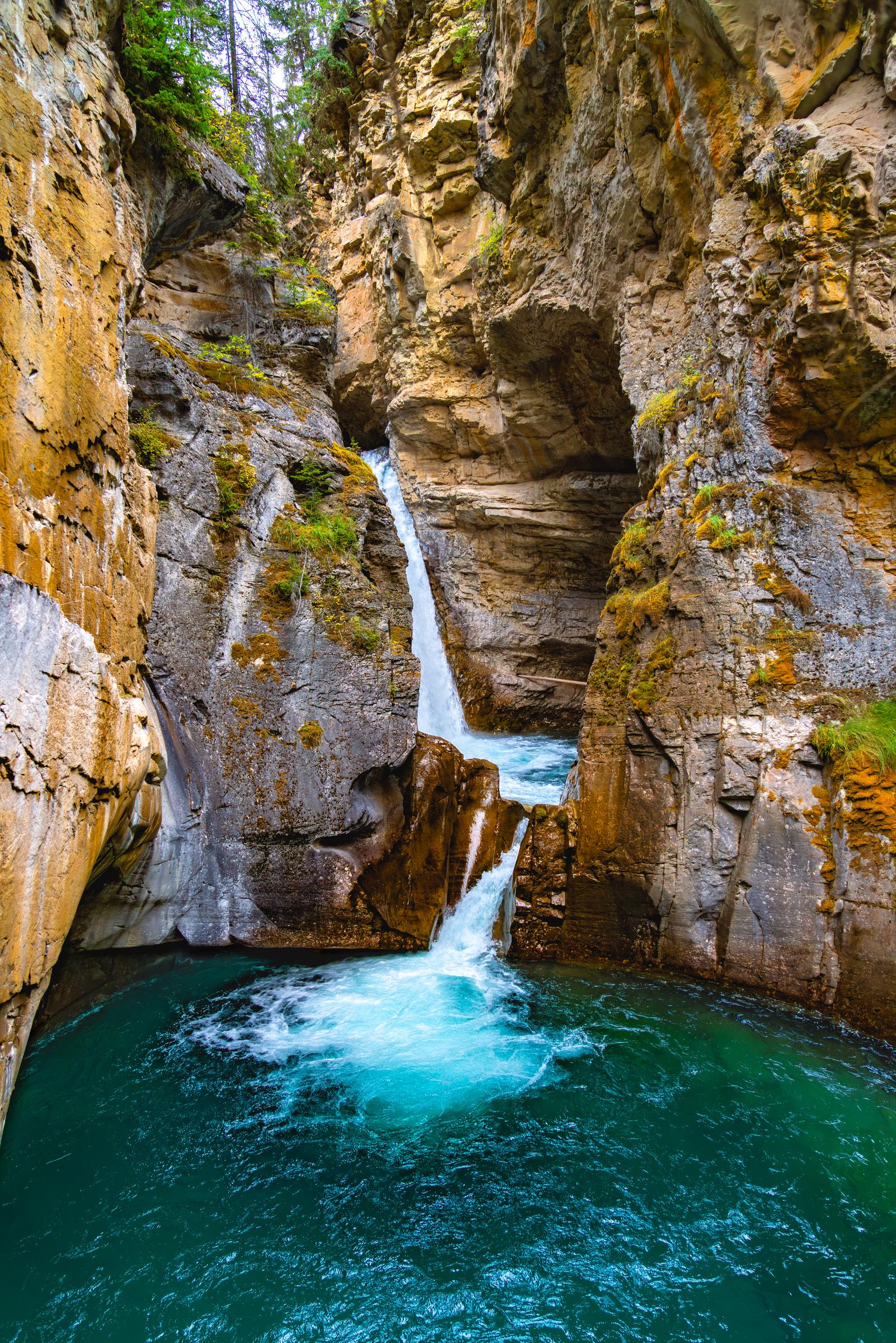 Waterfall in a Rocky Canyon Johnston Canyon AB Canada