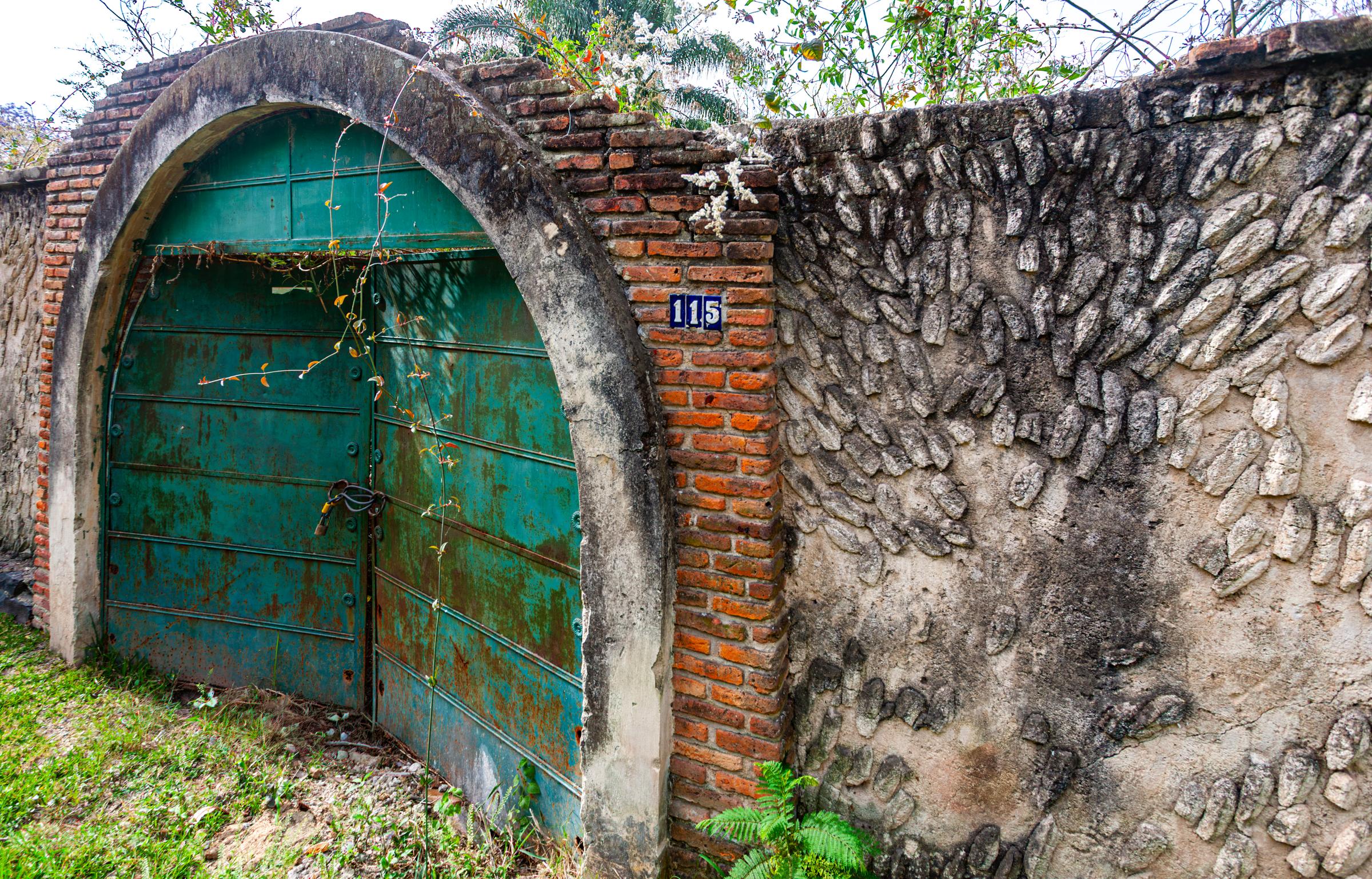 Old arched doorway with green door Chapala Jalisco Mexico