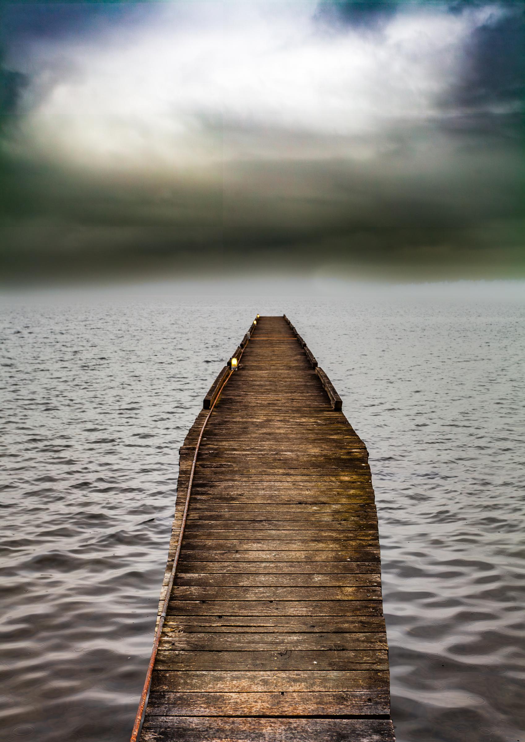 Wooden Pier Extending into Foggy Water Seattle Washington United States