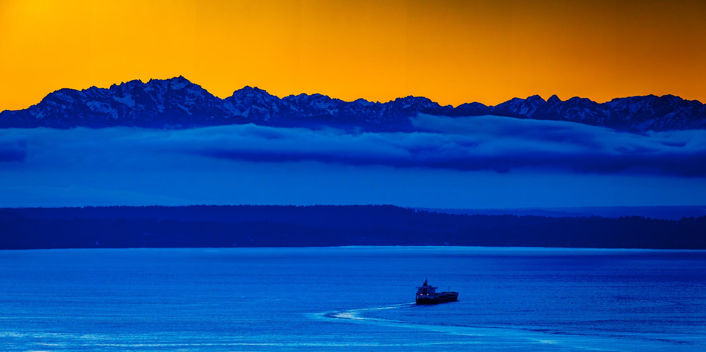 Boat on the water at dusk Seattle Washington United States