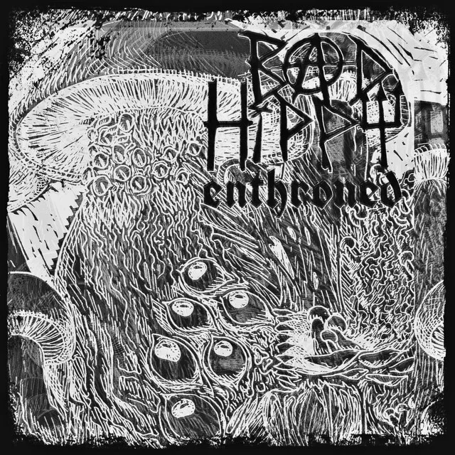 Enthroned cover